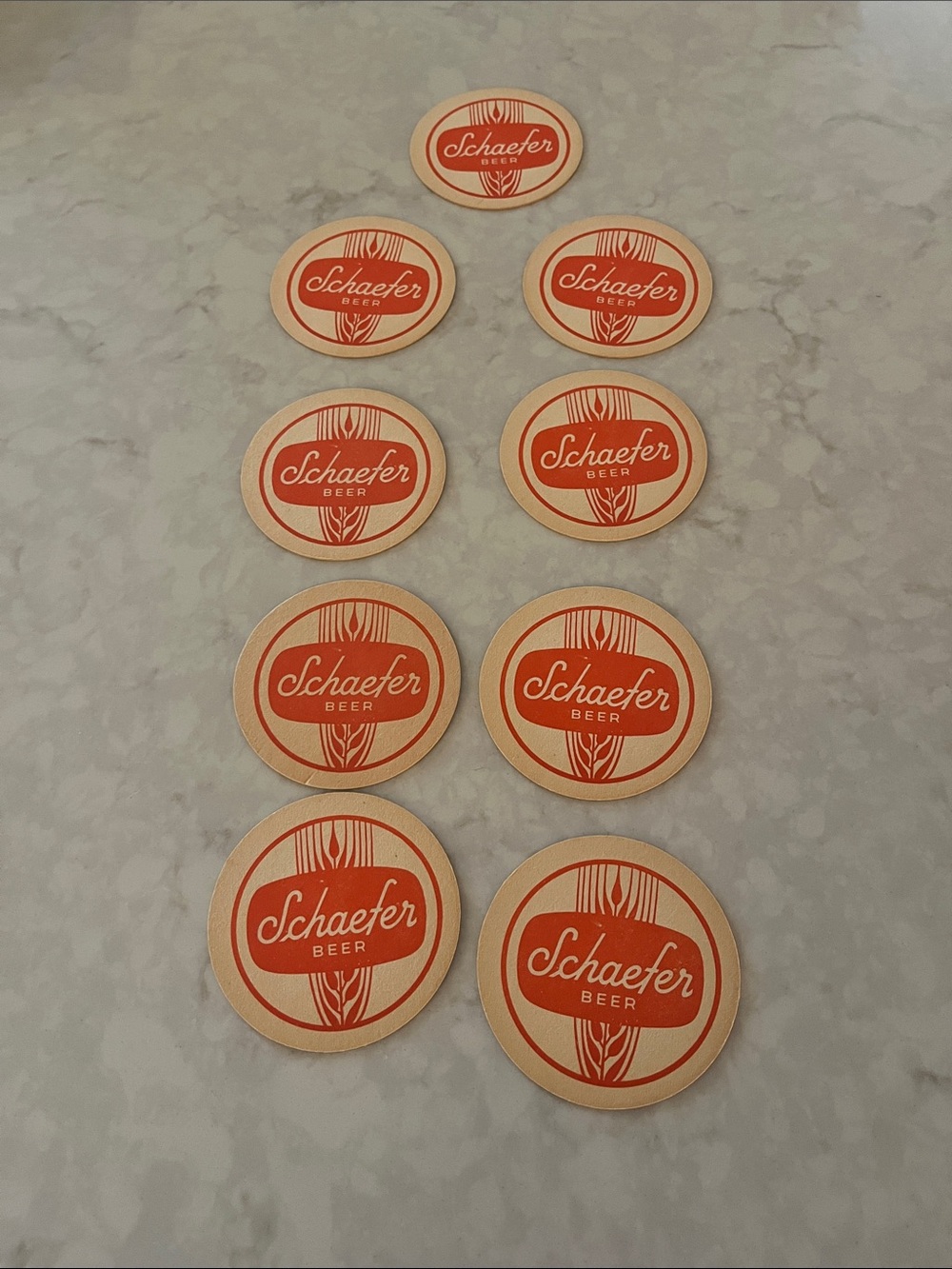 Vintage Schaefer Beer coasters, 1970s. Set of 9.